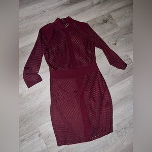 Burgundy mini dress, it’s transparent so have to wear something underneath.